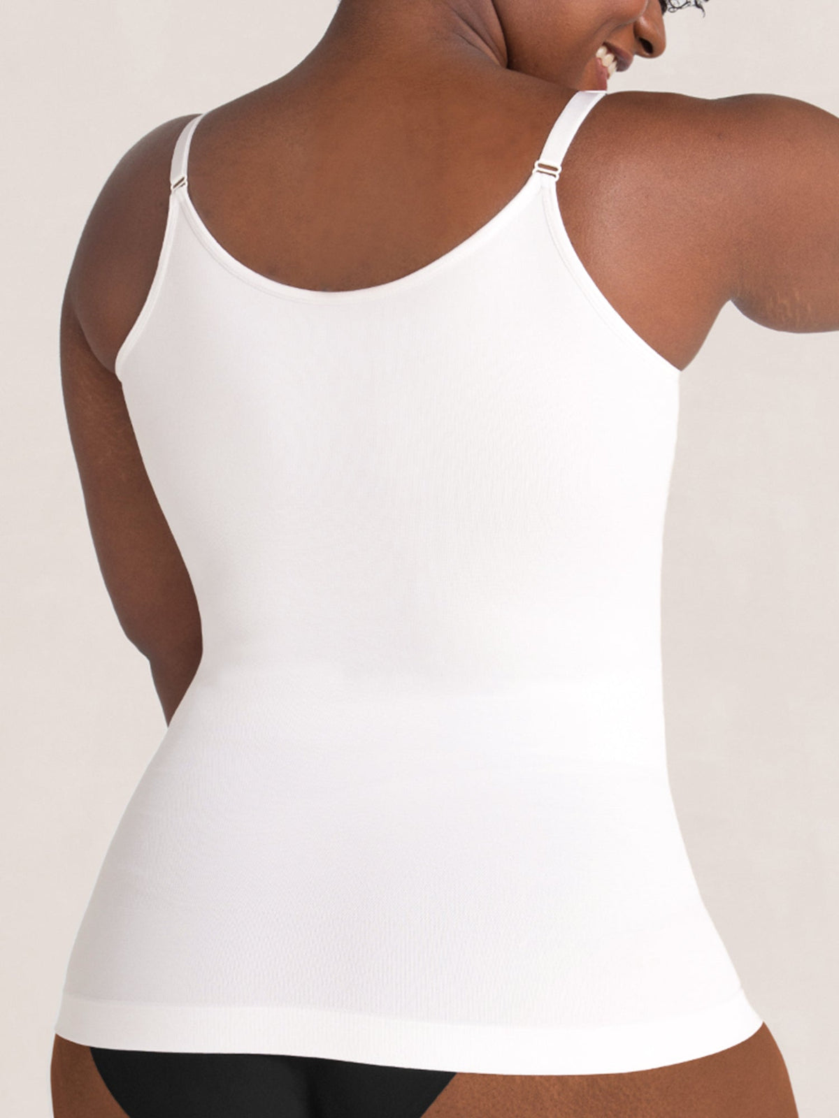 White shaping camisole with adjustable shoulder straps and side contour
