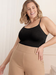 Lifestyle fit showing smooth tummy silhouette worn under casual cardigan
