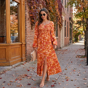 Flowy floral midi skirt with front slit and convenient side pockets