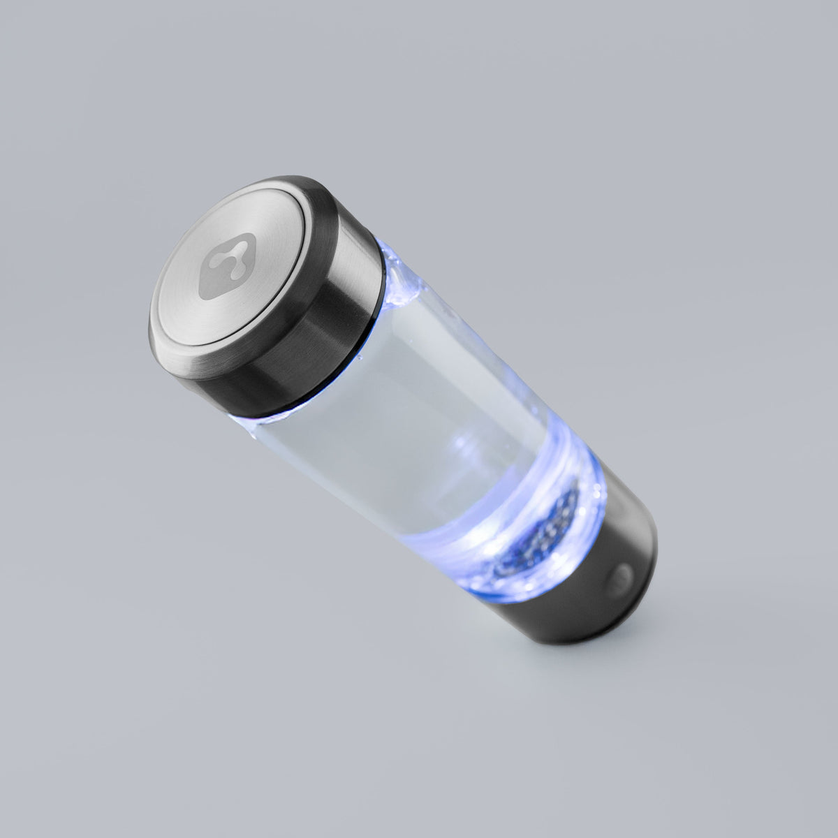 PureHydro portable hydrogen bottle lifestyle view on office desk and travel setup
