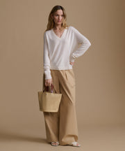 Everyday Relaxed Cashmere V-Neck Sweater in Ivory - Flattering drape and ribbed hem details