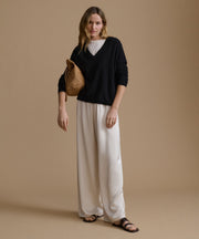 Everyday Relaxed Cashmere V-Neck Sweater in Black - Flattering drape and ribbed hem details